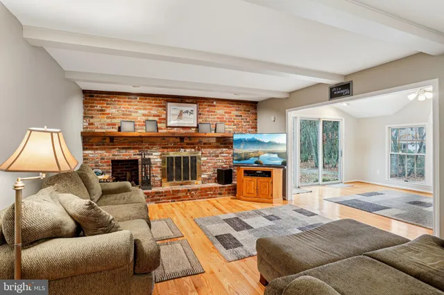 a view of a livingroom with furniture and a rug