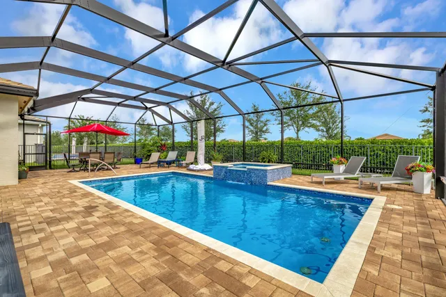 $824,900 | 11699 Southwest Coronado Springs Drive, Port St. Lucie, FL 34987