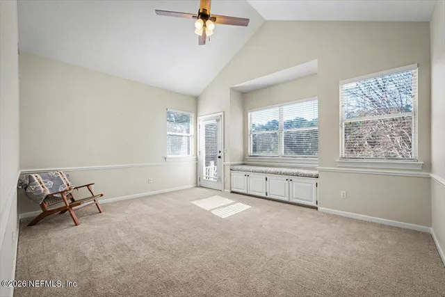 a view of a wooden fence