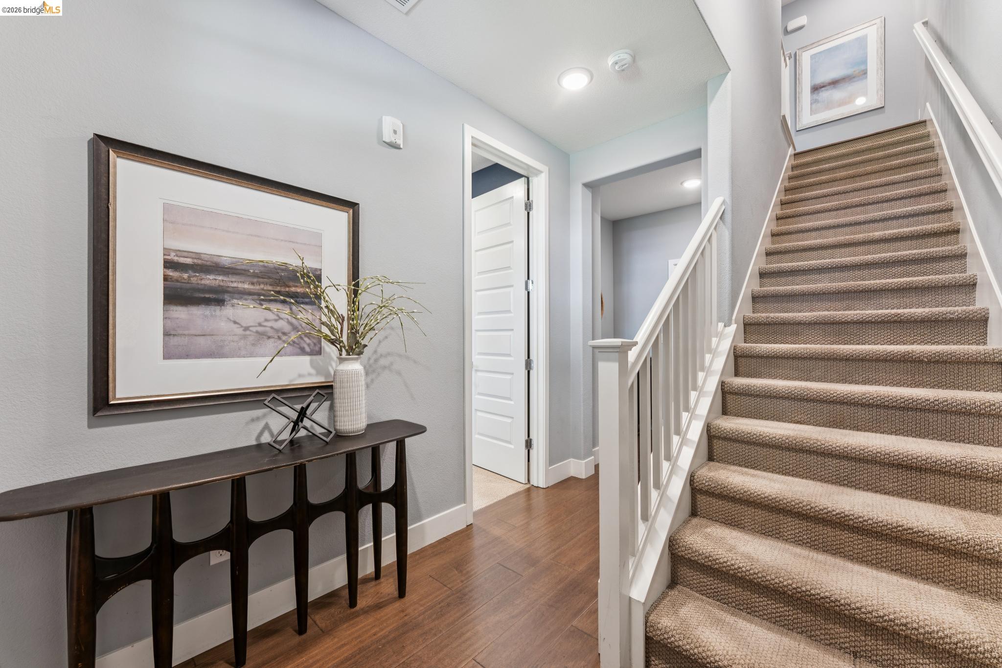 489 Diller Street Alameda, CA 94501 - Photo 16 of 60 Stairway featuring wood finished floors and baseboards