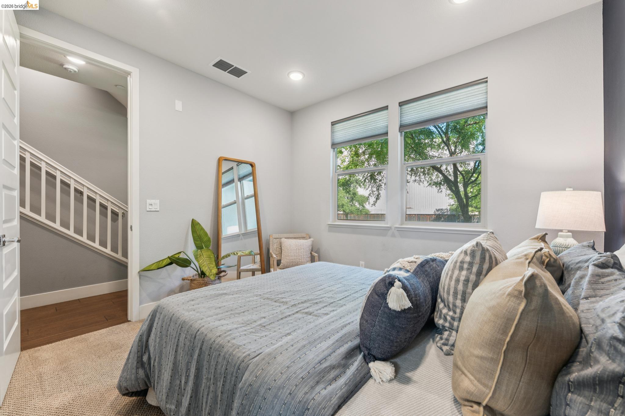 489 Diller Street Alameda, CA 94501 - Photo 25 of 60 Bedroom with multiple windows, recessed lighting, and wood finished floors