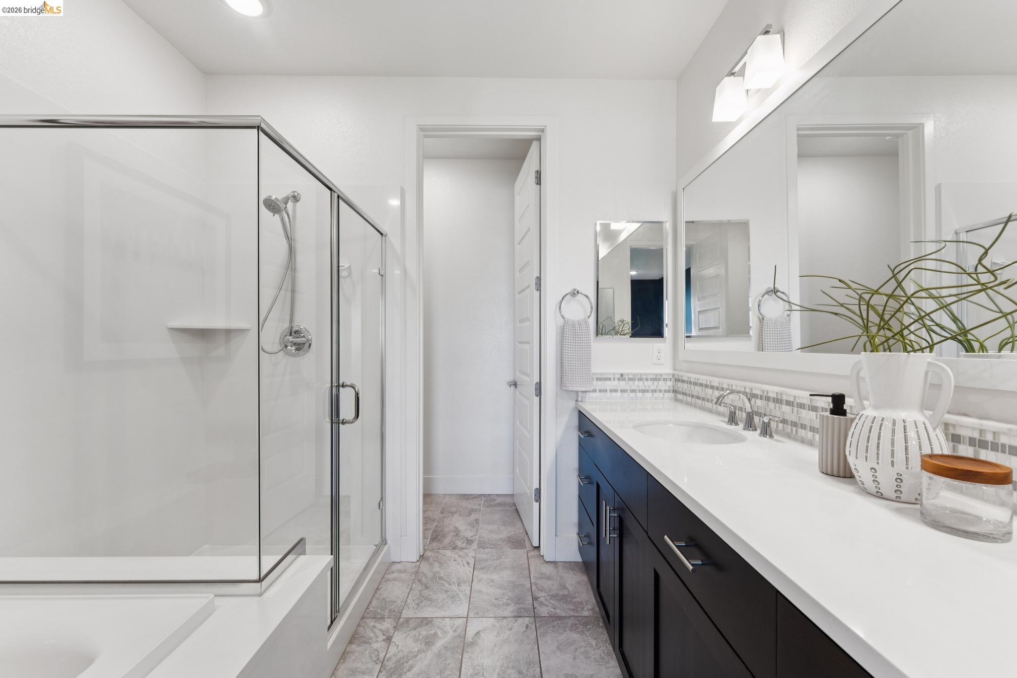 489 Diller Street Alameda, CA 94501 - Photo 34 of 60 Full bath featuring vanity, a shower stall, and a bath