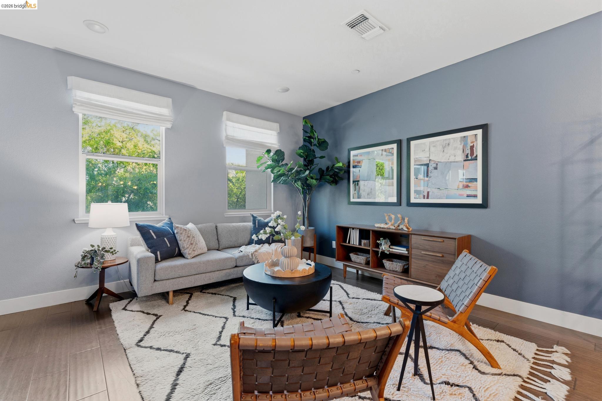 489 Diller Street Alameda, CA 94501 - Photo 9 of 60 Living room featuring baseboards and wood finished floors
