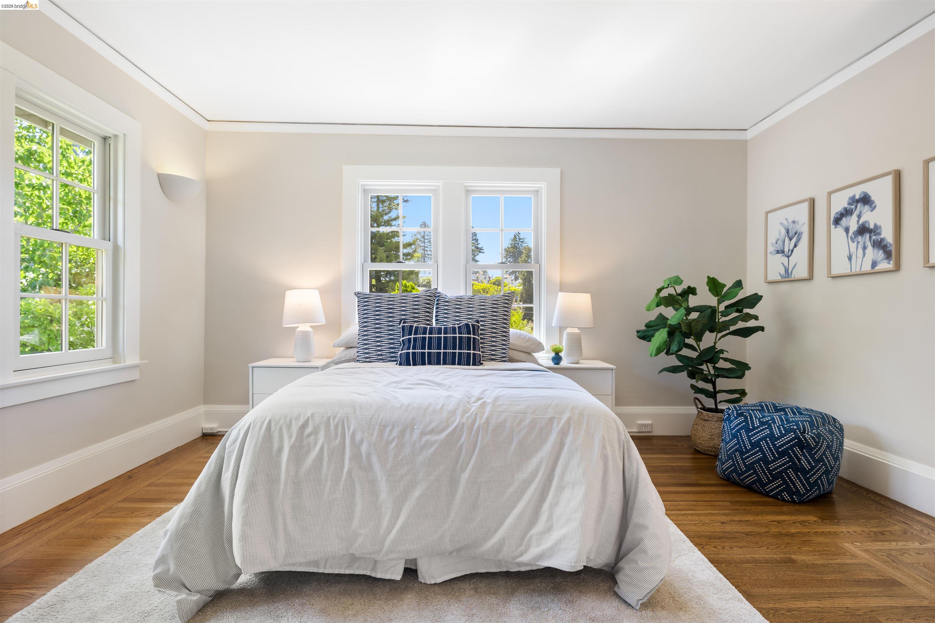 900 Euclid Avenue Berkeley, CA 94708 - Photo 28 of 54 a bedroom with a bed a chandelier and a window