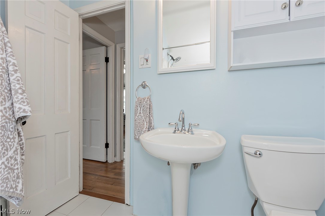 1604 Biltmore Road Cleveland, OH 44124 - Photo 28 of 40 Bathroom with hardwood / wood-style floors and toilet