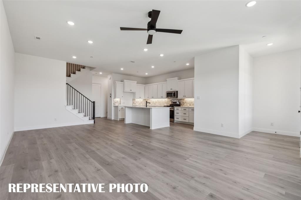 1331 Rooted Road Frisco, TX 75033 - Photo 14 of 14 Our Helaina plan offers an inviting, open floor plan perfect for entertaining family and friends. REPRESENTATIVE PHOTO