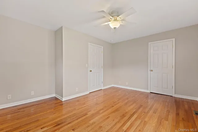 a bathroom with a sink mirror and a shower
