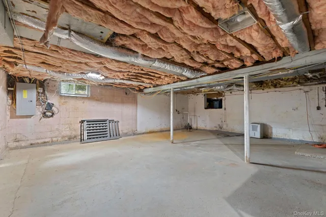 a house view with a sitting space and garden