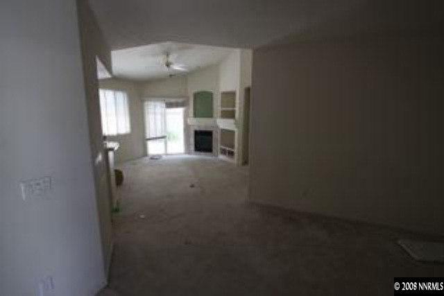 1113 Tule Drive Reno, NV 89521 - Photo 3 of 8 a view of empty room with large windows