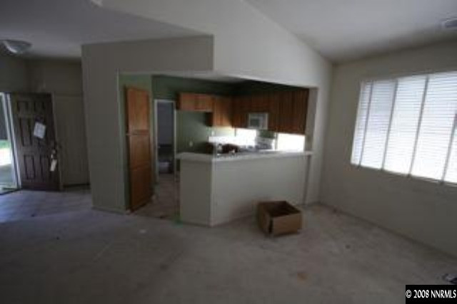 1113 Tule Drive Reno, NV 89521 - Photo 4 of 8 a room with window and furniture
