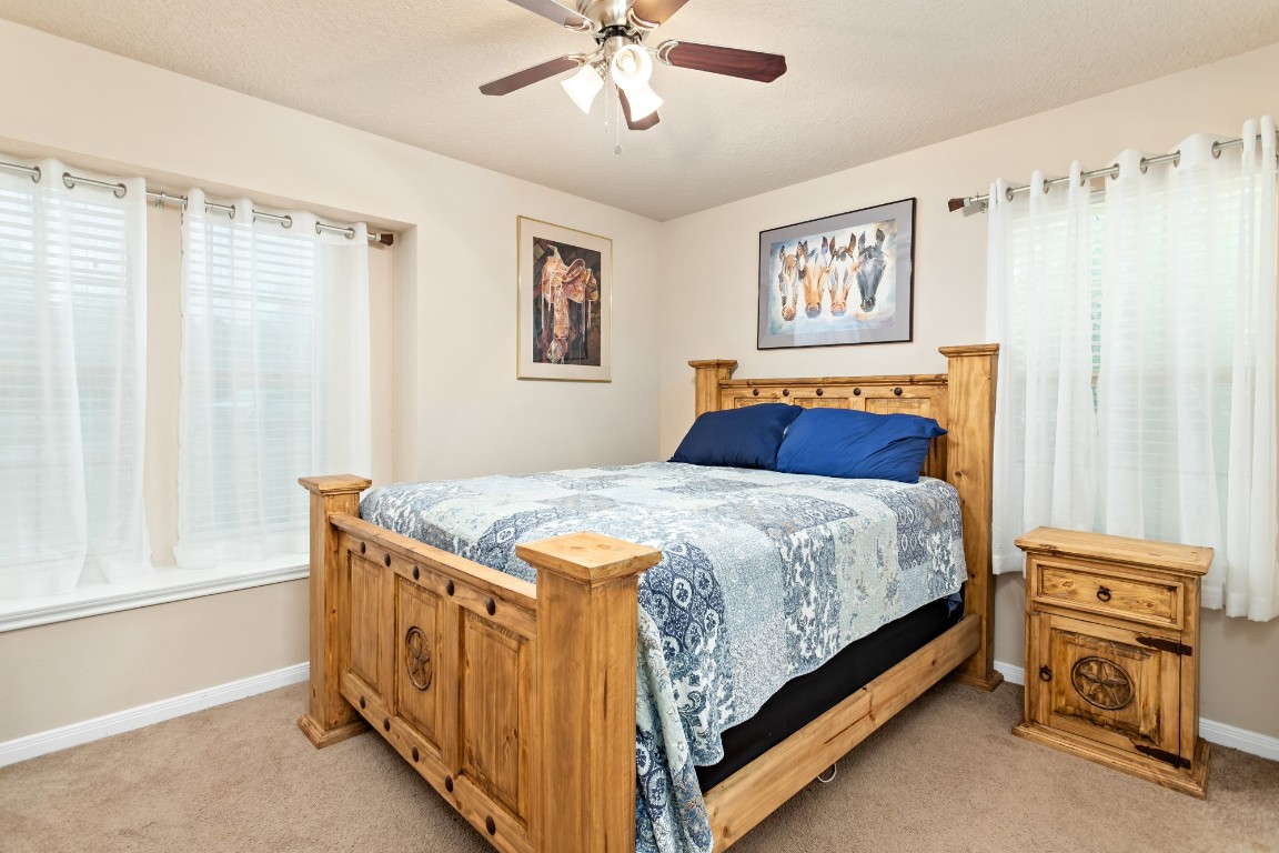 4985 Fm 2827 Road Warren, TX 77664 - Photo 21 of 41 a bedroom with a bed and a window