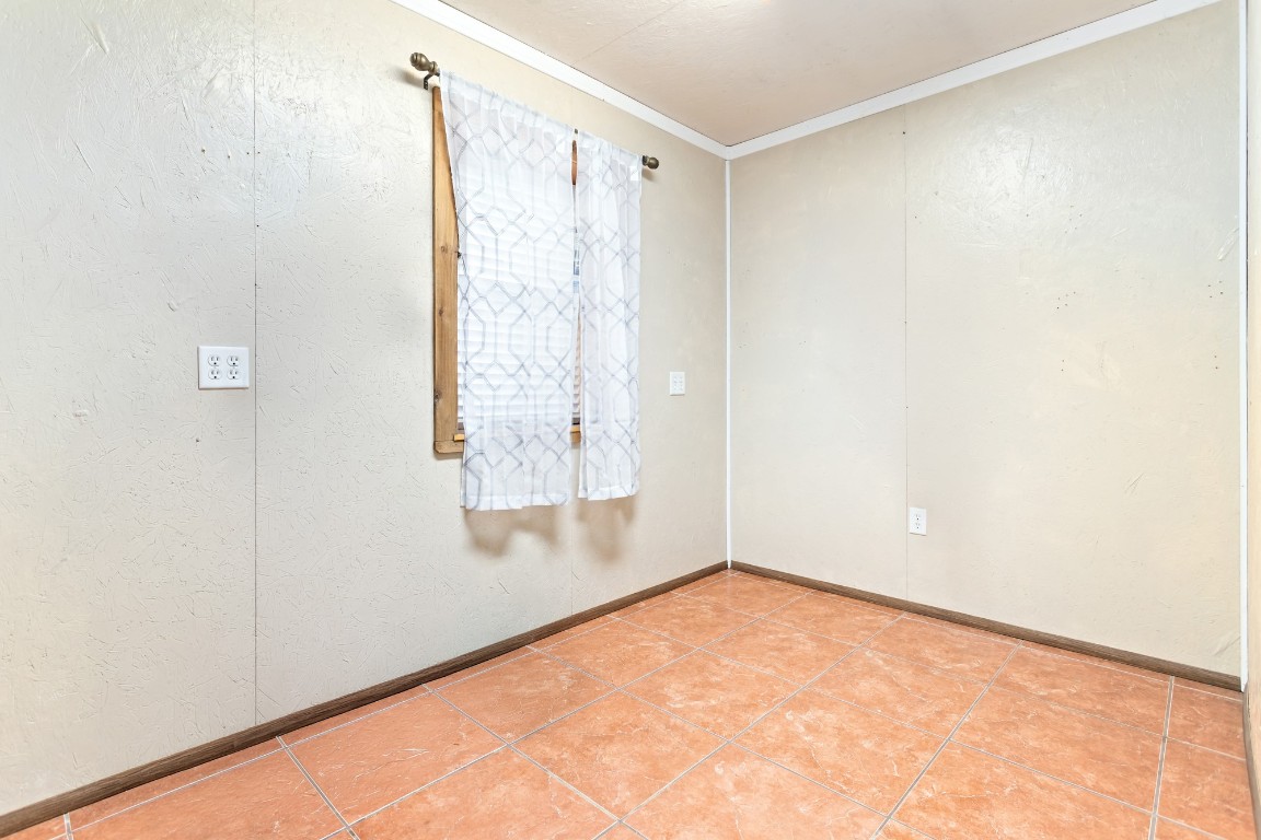 4985 Fm 2827 Road Warren, TX 77664 - Photo 37 of 41 a view of an empty room with a window