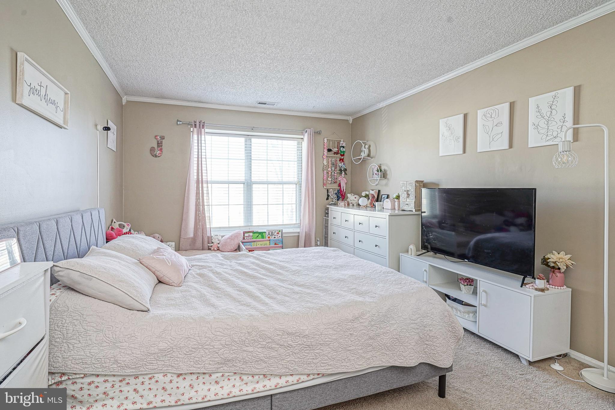 2402 Sedgefield Drive Mount Laurel, NJ 08054 - Photo 13 of 22 a bedroom with a bed and a flat screen tv