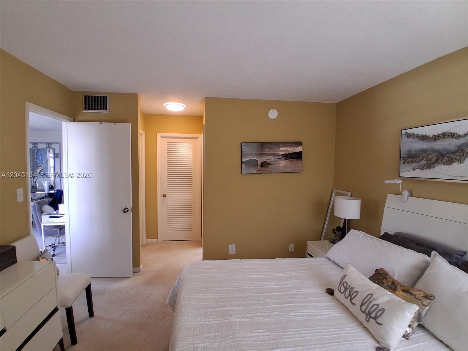 555 Northwest 4th Avenue, Unit 4250 Boca Raton, FL 33432 - Photo 9 of 21 Primary Bedroom