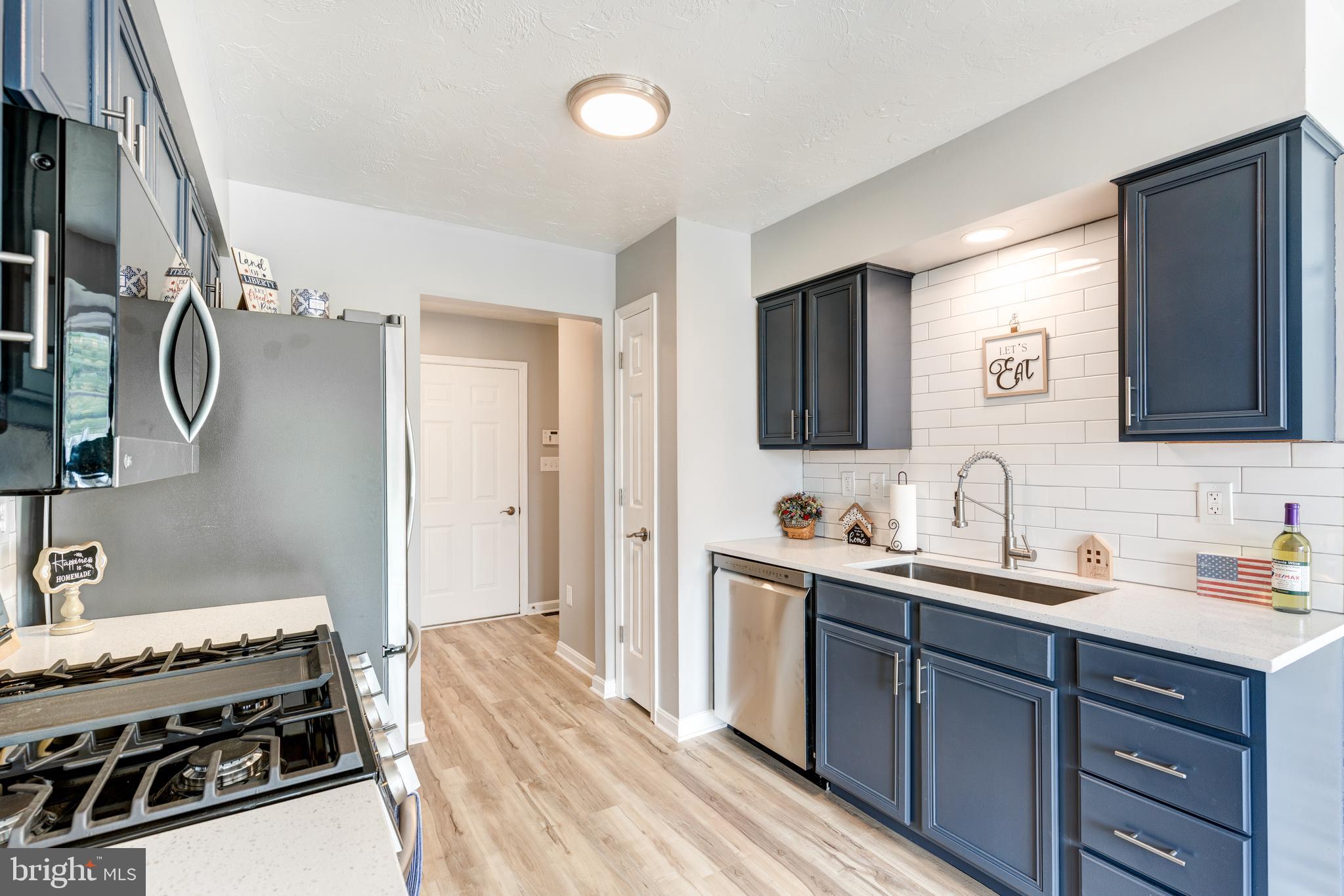 159 Colorado Avenue Littlestown, PA 17340 - Photo 18 of 47 a spacious bathroom with a sink and a mirror