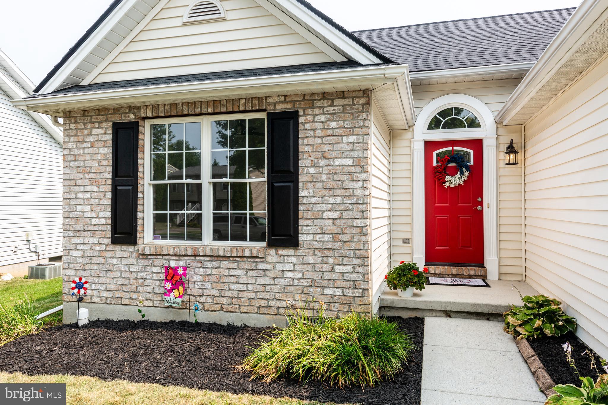 159 Colorado Avenue Littlestown, PA 17340 - Photo 4 of 47 a front view of a house with a yard