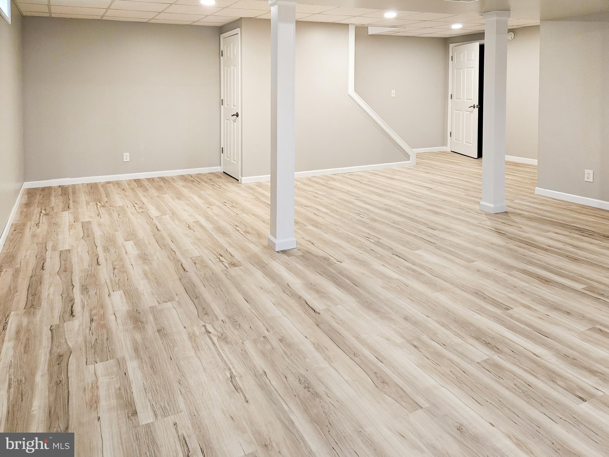 159 Colorado Avenue Littlestown, PA 17340 - Photo 43 of 47 an empty room with wooden floor and entryway