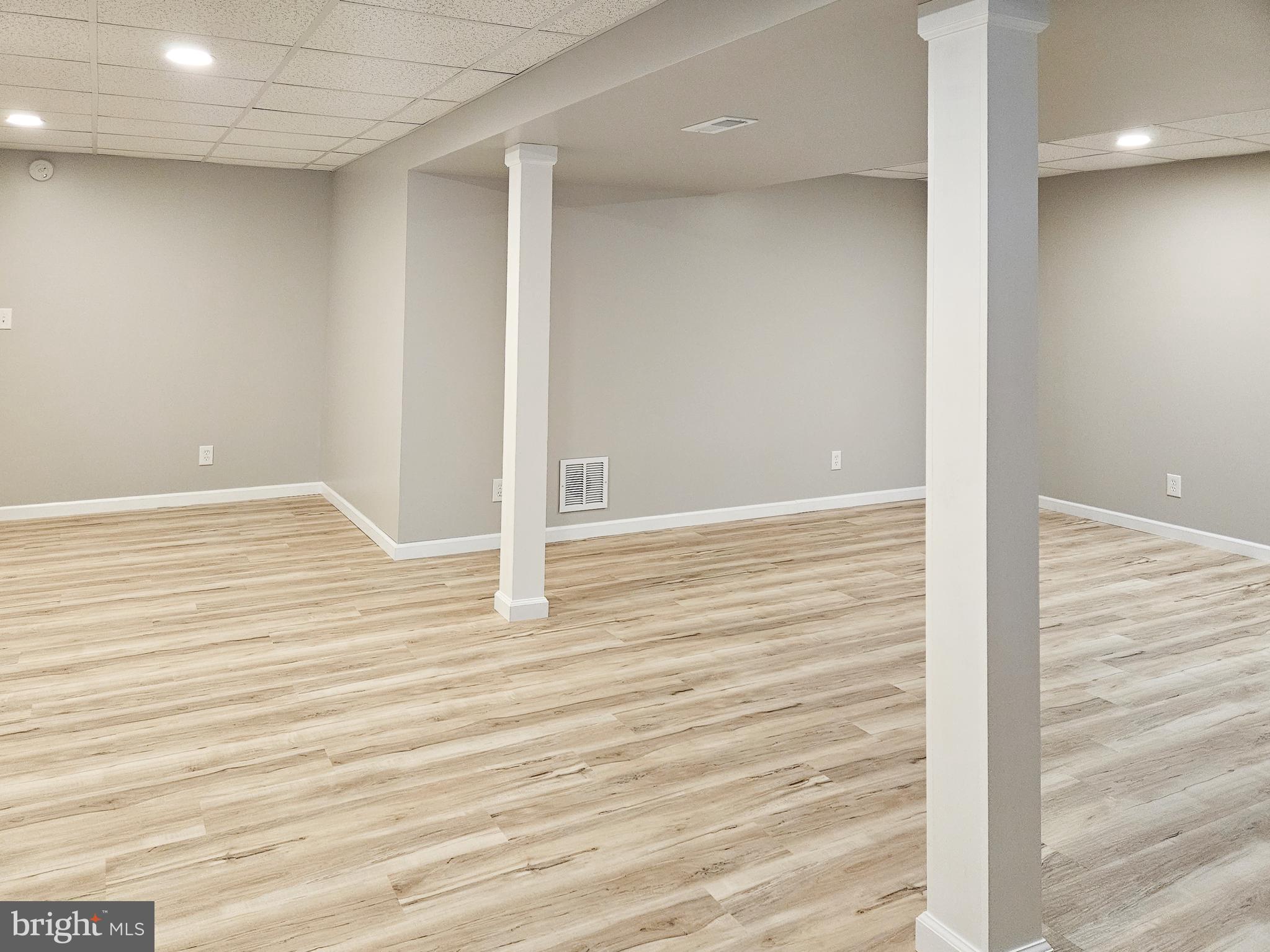 159 Colorado Avenue Littlestown, PA 17340 - Photo 44 of 47 a view of an empty room with wooden floor