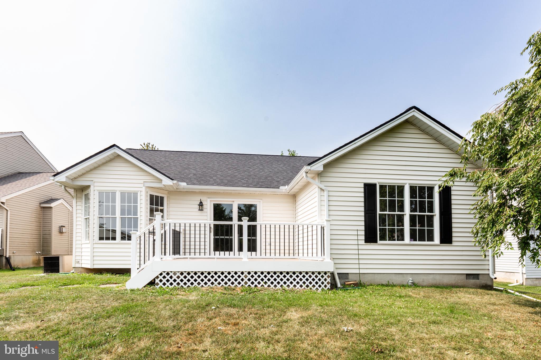 159 Colorado Avenue Littlestown, PA 17340 - Photo 5 of 47 a front view of a house with a yard