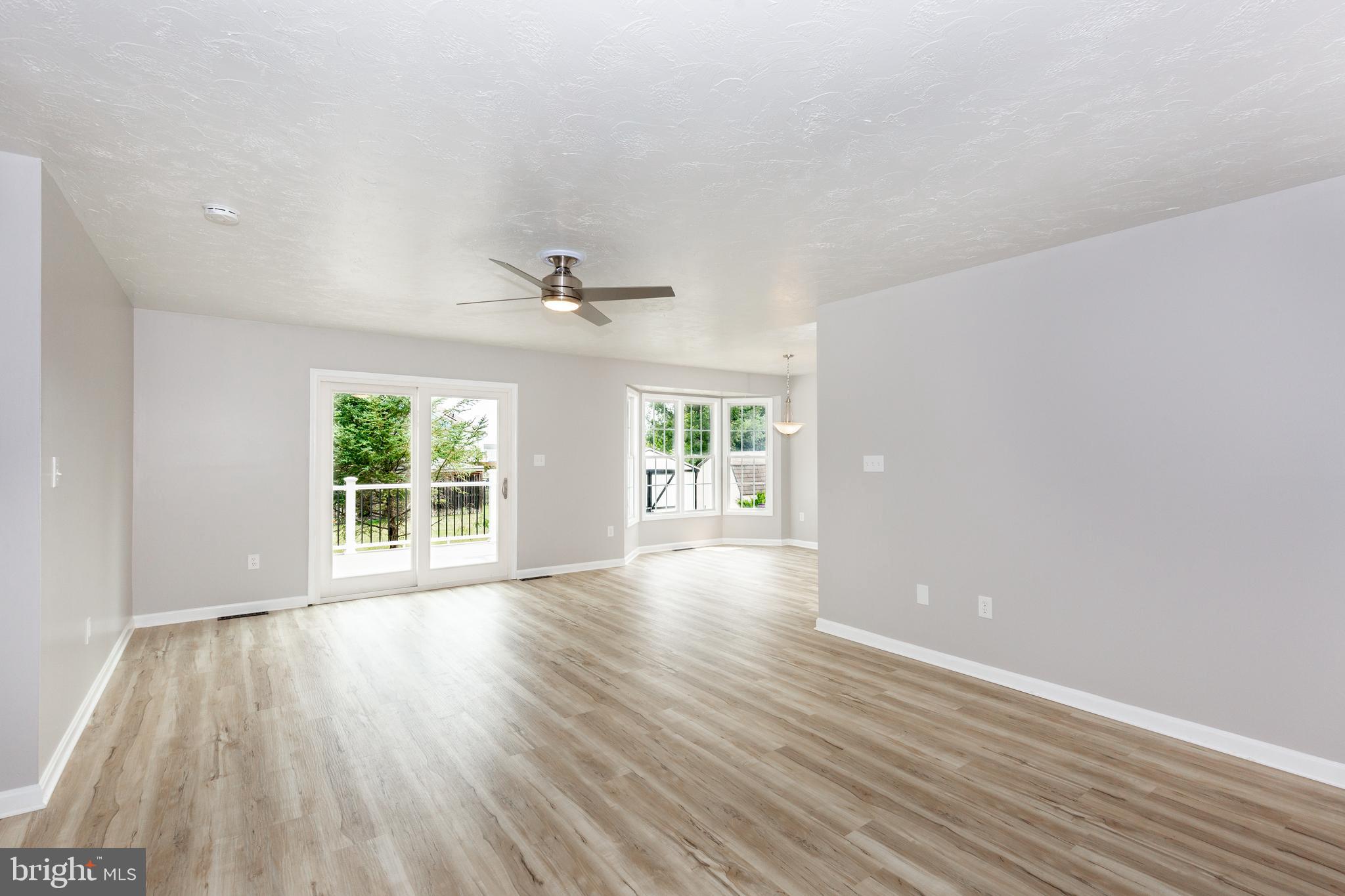 159 Colorado Avenue Littlestown, PA 17340 - Photo 8 of 47 wooden floor in an empty room with a window