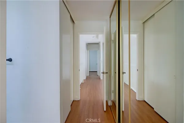 a bathroom with a sink double vanity and a mirror
