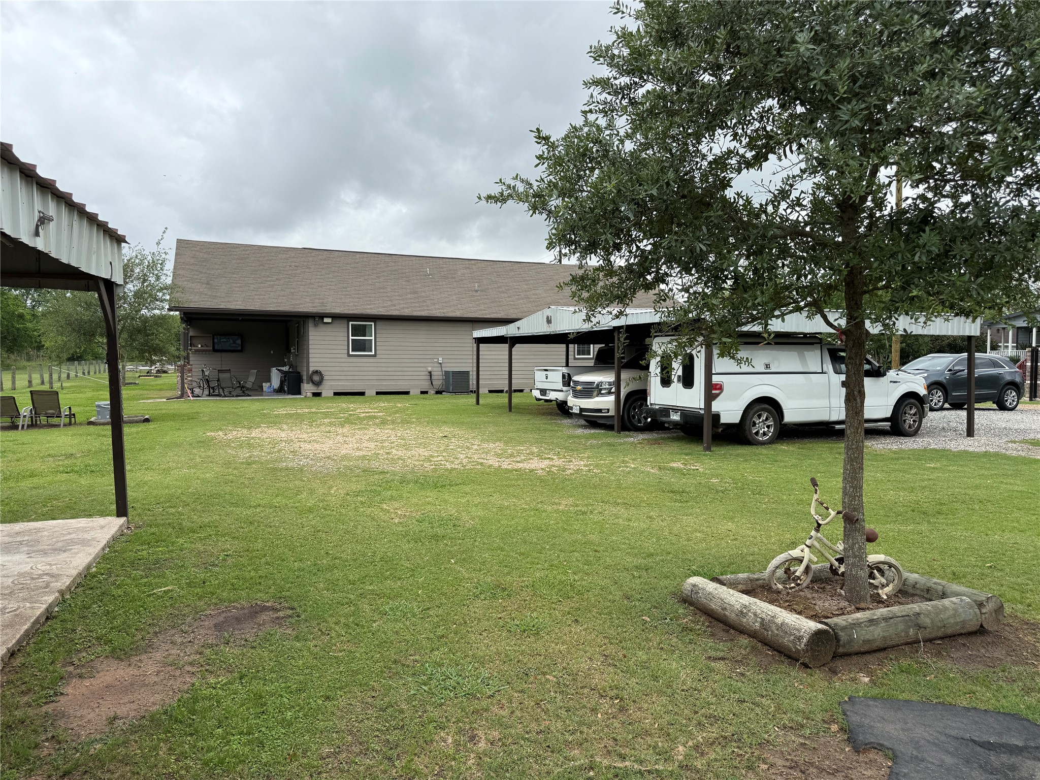 13125 1st Street Kendleton, TX 77417 - Photo 15 of 23 a car parked in front of the house