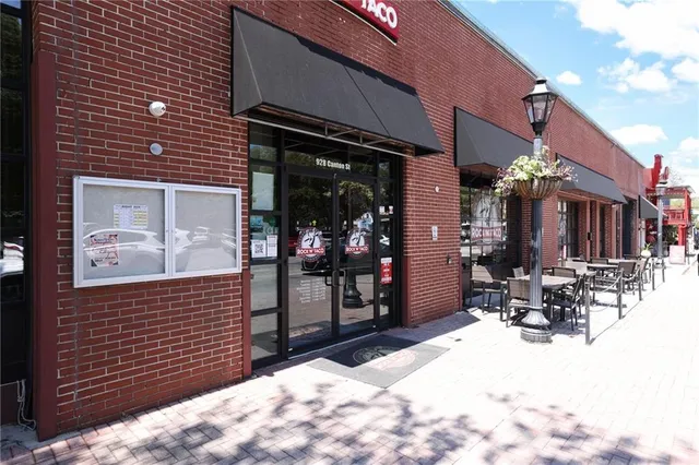 a view of a chairs and table in a patio