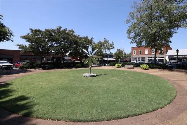 a view of a street with cars