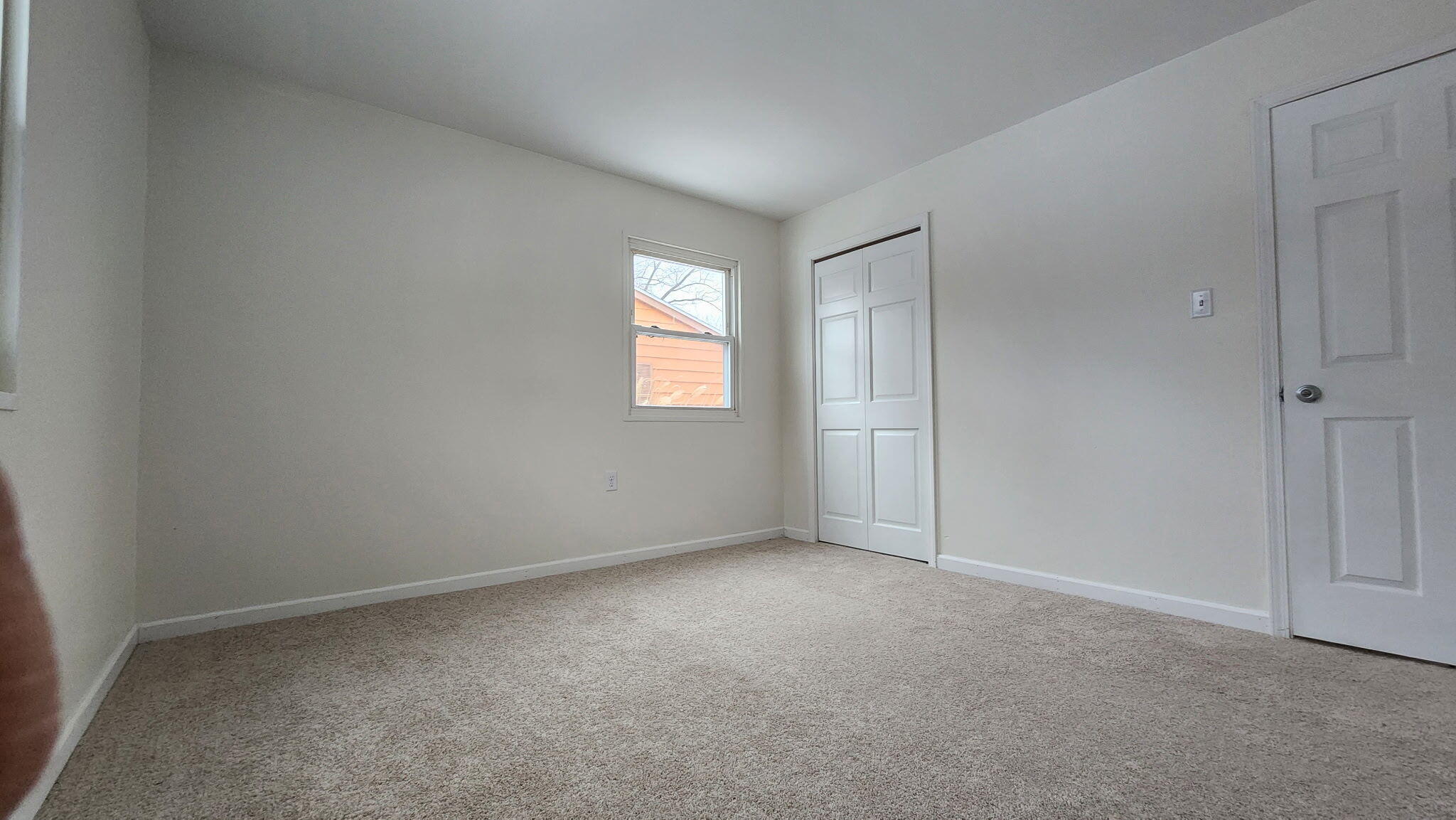 723 Fox River Road Valparaiso, IN 46385 - Photo 8 of 13 a view of an empty room with window