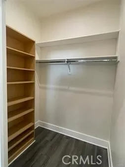 a view of an empty walk in closet