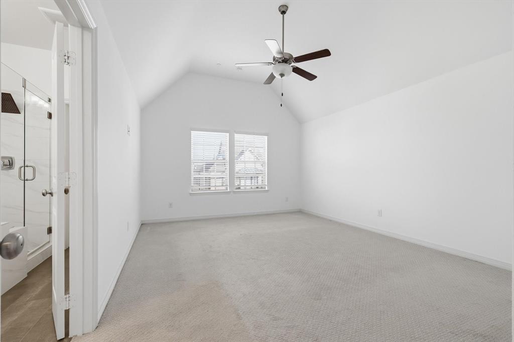 228 Skystone Drive Irving, TX 75038 - Photo 17 of 28 a view of an empty room with a window