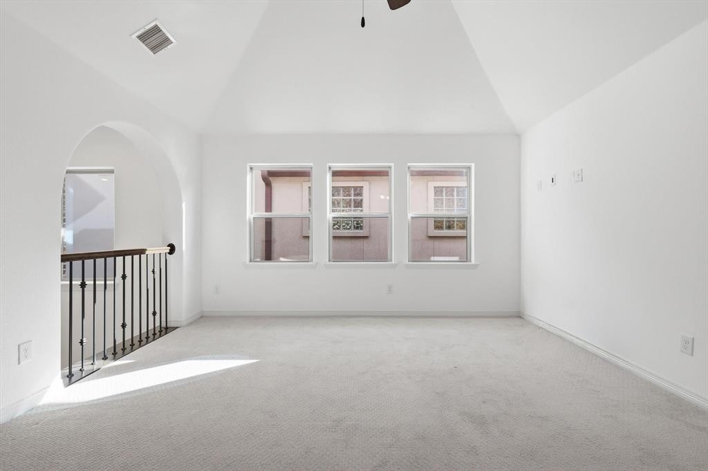 228 Skystone Drive Irving, TX 75038 - Photo 18 of 28 a view of empty room with windows
