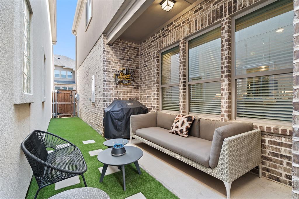 228 Skystone Drive Irving, TX 75038 - Photo 24 of 28 a living room with furniture and a window