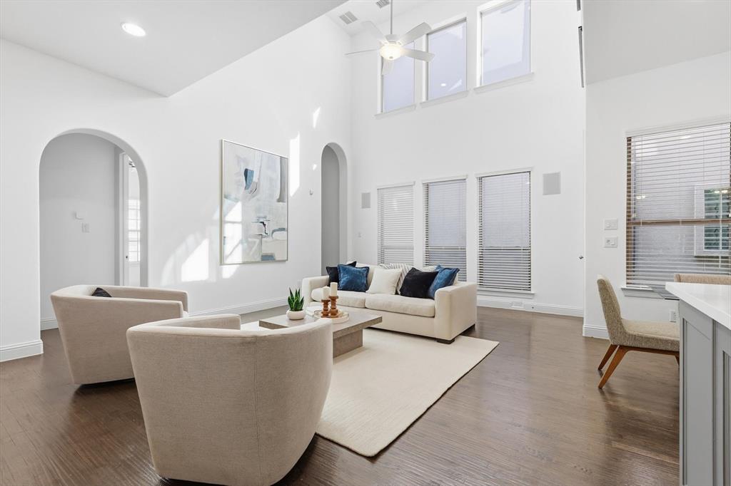 228 Skystone Drive Irving, TX 75038 - Photo 6 of 28 a living room with furniture and wooden floor