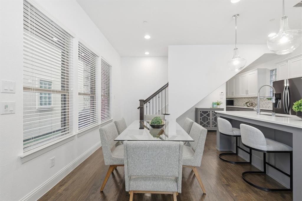 228 Skystone Drive Irving, TX 75038 - Photo 8 of 28 a view of a dining room with furniture and a window