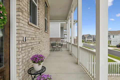 a view of a room with outdoor seating