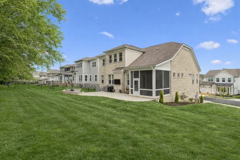 a view of a house with a big yard