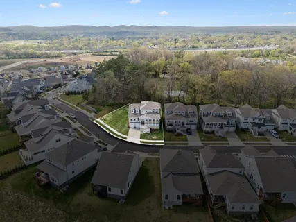 an aerial view of a house with a outdoor space