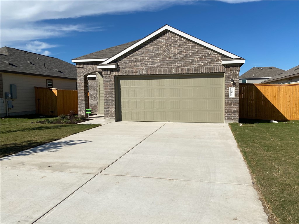 a view of backyard of garage