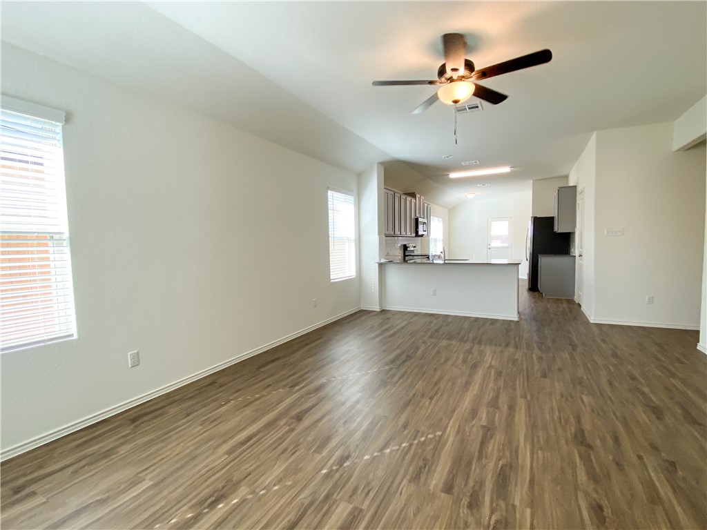 301 Greatest Gift Way Jarrell, TX 76537 - Photo 4 of 20 a view of an empty room with a window