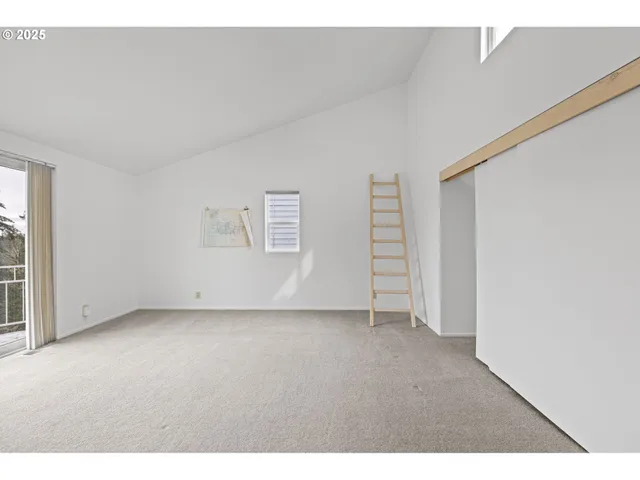a bathroom with a granite countertop sink a mirror and a shower