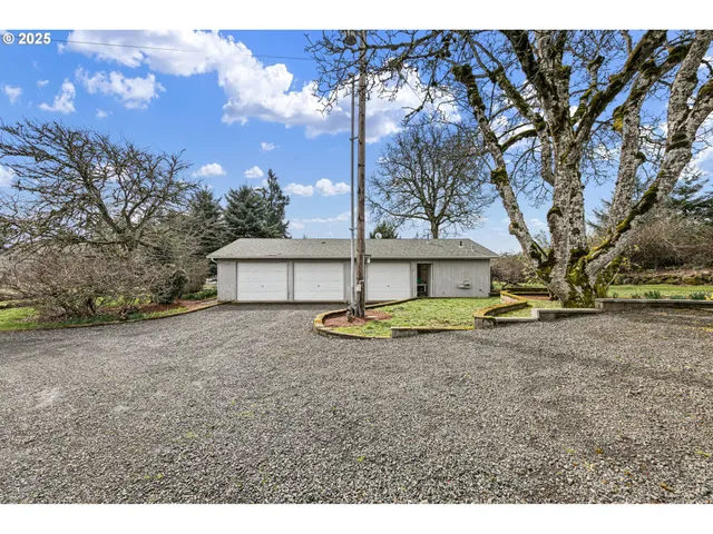 a view of an empty room with a fireplace