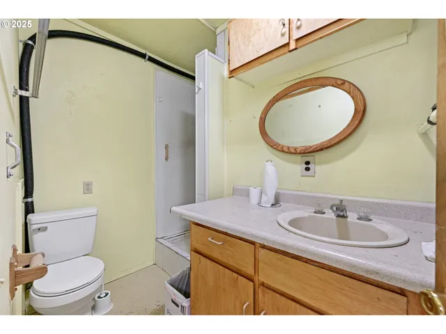 a front view of house with yard and trees