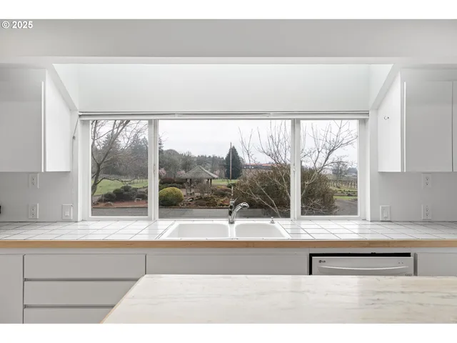 a view of a living room and window