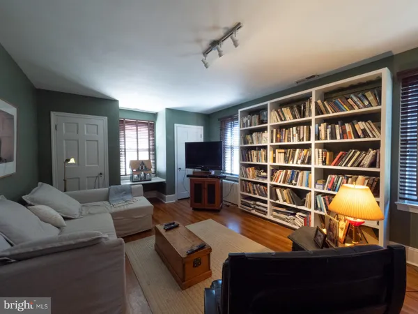 a view of a balcony with chairs