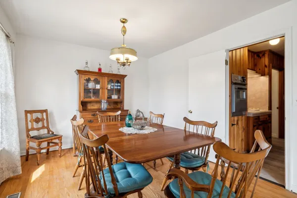 a large kitchen with stainless steel appliances granite countertop a sink and cabinets