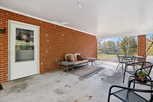 an aerial view of residential house with outdoor space