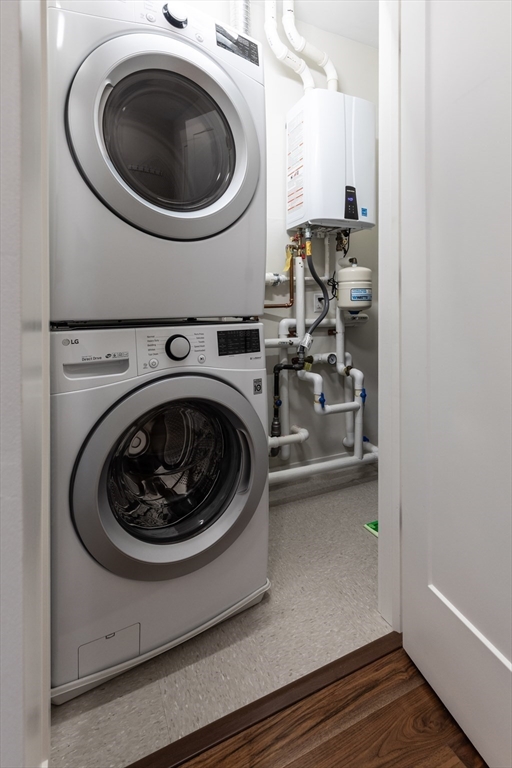 3531 Washington Street, Unit 322D Boston, MA 02130 - Photo 19 of 24 a utility room with sink dryer and washer