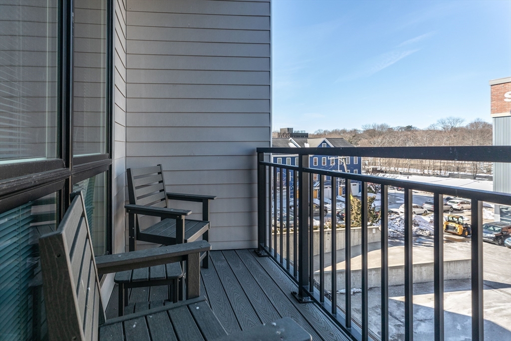 3531 Washington Street, Unit 322D Boston, MA 02130 - Photo 8 of 24 a view of a balcony with chairs