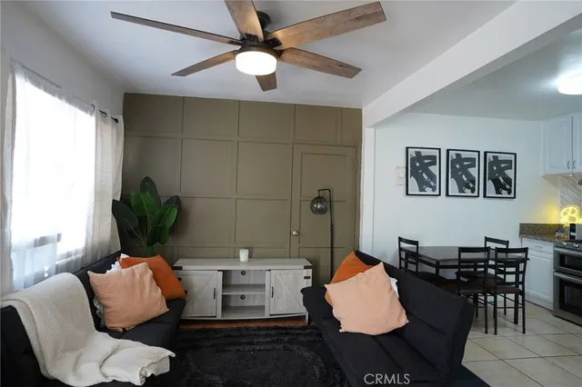 a kitchen with a stove a sink and a refrigerator